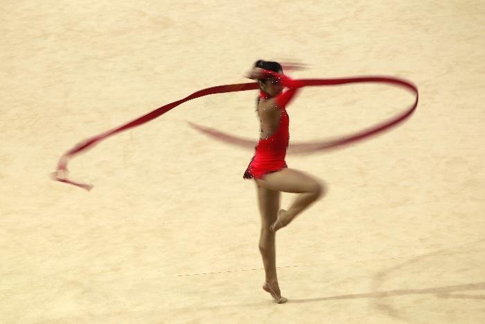 Ana Carrasco Pini, of Argentina, performs with the ribbon in the individual all-around rhythmic gymnastics competitions during the 2011 Pan American Games in Guadalajara, Mexico, Saturday, Oct. 15, 2011.(AP Photo/Dario Lopez-Mills)